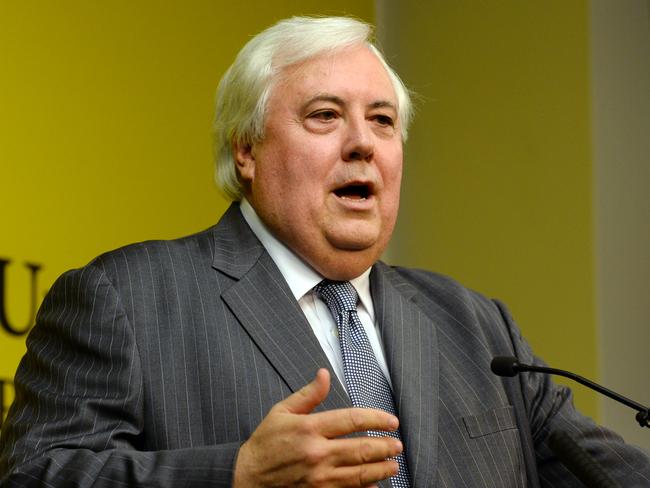 Federal MP and mining magnate Clive Palmer speaks to the media during a press conference in Brisbane, Friday, June 13, 2014. Mr Palmer says he will sue Queensland Deputy Premier Jeff Seeney for claiming he sought preferential treatment for his coal projects in the Galilee basin. (AAP Image/Dan Peled) NO ARCHIVING