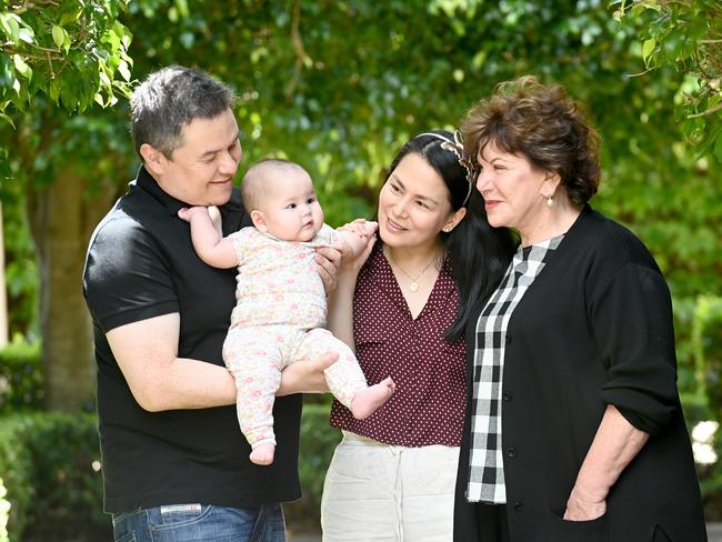 SYDNEY, AUSTRALIA - December 8, 2022: Dr Anne Clark with parents Joel and Patricia Townsend and 7 month old daughter Marelle. Picture: Jeremy Piper