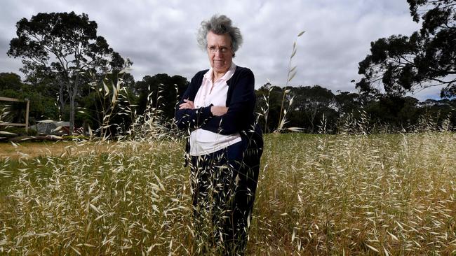 Judith Mair in the tall, dry grass at the abandoned Belair golf course. Picture: Tricia Watkinson