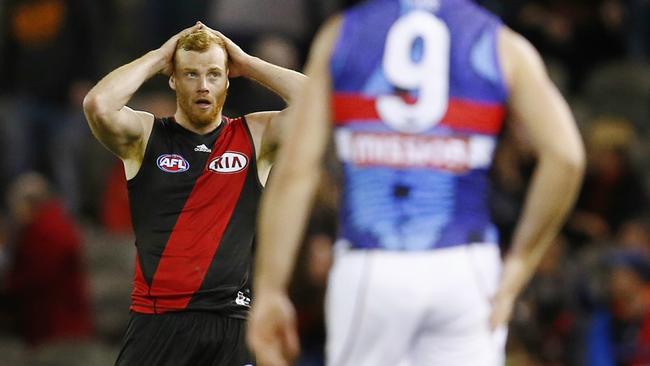 Adam Cooney confronts his old Bulldogs teammates on the field. Picture: Michael Klein