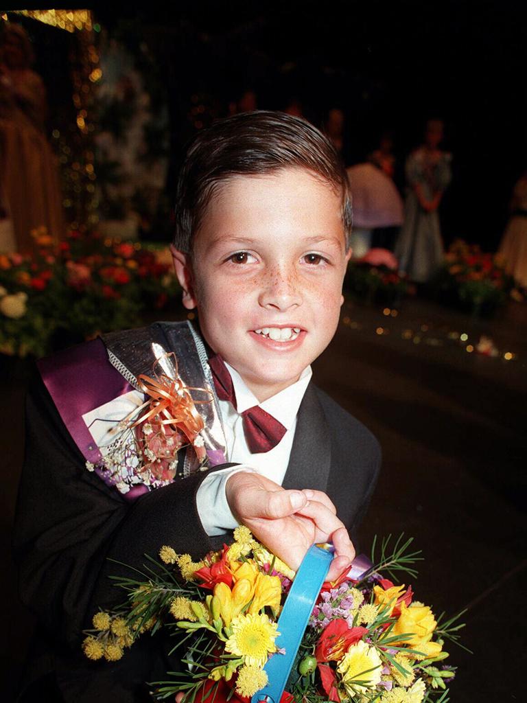 Socials - Kristopher Glass (carnival page boy) at Toowoomba Carnival of Flowers 21 Sept 1997 Fairs festivals Aust beauty contests children blooms headshot