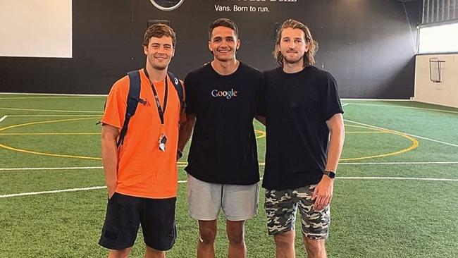 Ugle-Hagan with Western Bulldogs stars Josh Dunkley, left and Marcus Bontempelli.