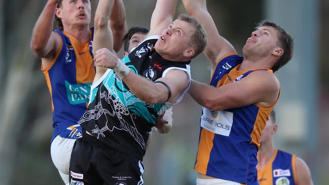 Coby Perry tries to win the ball for Maryborough last season against Golden Square players. Picture Yuri Kouzmin