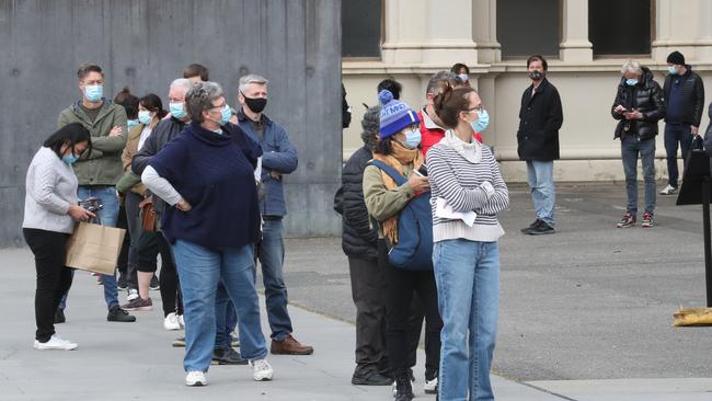 People were expecting a several hour wait time to get vaccinated in Melbourne on Saturday. Picture: David Crosling