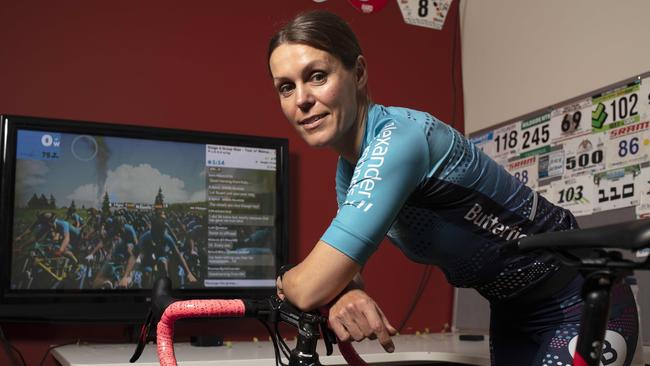 Now that COVID-19 has ended all bike races bike enthusiasts such as SueAnn Woodwiss are turning to indoor biking – and Zwift offers bike races with the pros. SueAnn competing at home. Photographer Emma Brasier