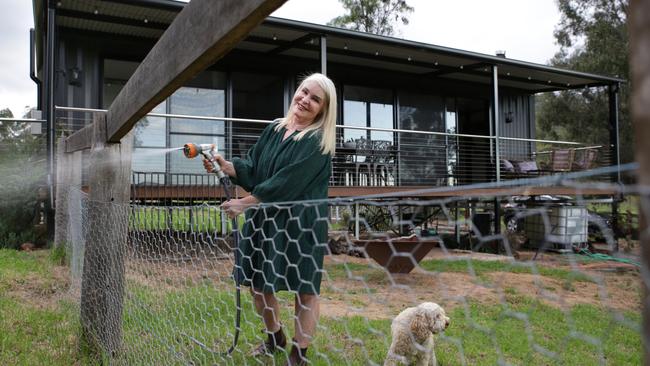 O’Regan added a deck and a sleek, atmospheric interior to her container home. Picture: Dean Marzolla