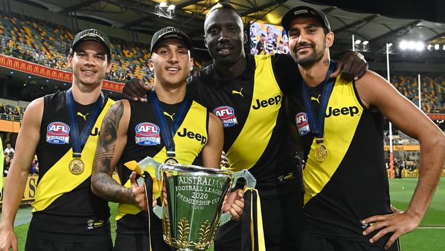 Pickett celebrates with premiership teammates Daniel Rioli, Shai Bolton and Mabior Chol. Picture: Getty Images