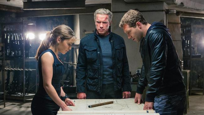 Left to right: Emilia Clarke plays Sarah Connor, Arnold Schwarzenegger plays the Terminator, and Jai Courtney plays Kyle Reese in Terminator Genisys from Paramount Pictures and Skydance Productions.