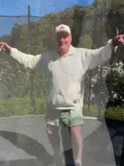 Alan Jones bouncing on a trampoline.