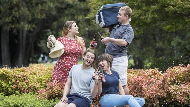 Alice Boronovskis, Jack Boronovskis, Marion Abraham and Tim Warburton taste some local beers in Treasury Gardens. Picture: Alex Coppel