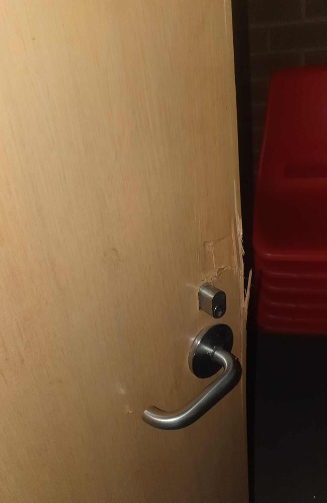 Doors of the club were damaged in the alleged break-ins. Picture: Supplied/Ken Jones