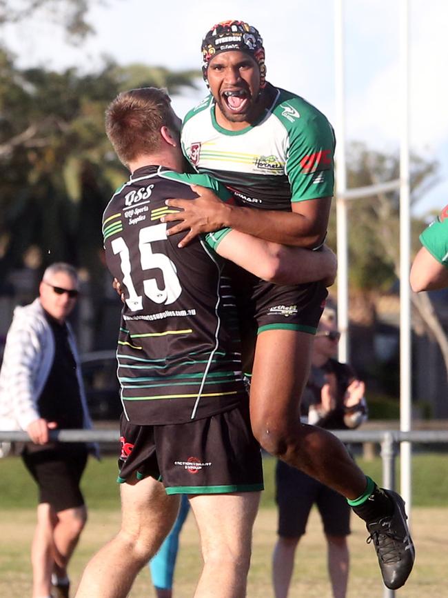 Brent Barnes celebrates for Helensvale. Picture by Richard Gosling