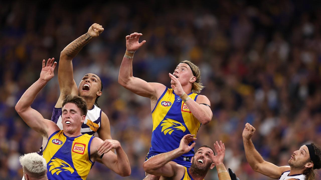 Reid (centre) has been better than advertised in his rookie year. (Photo by Will Russell/AFL Photos via Getty Images)