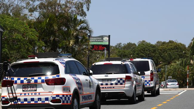 Scenes outside Helensvale Primary School after it went into lockdown. Photograph: Jason O'Brien