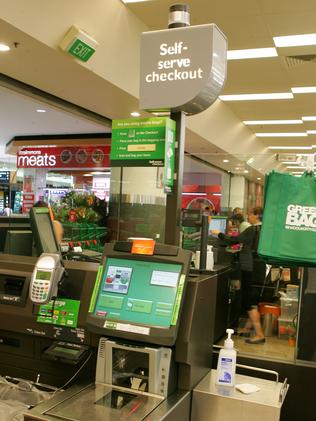 Self-service checkouts (above) are preferred by younger shoppers who want to stay “in the zone” rather than speak to supermarket staff. Picture: News Corp