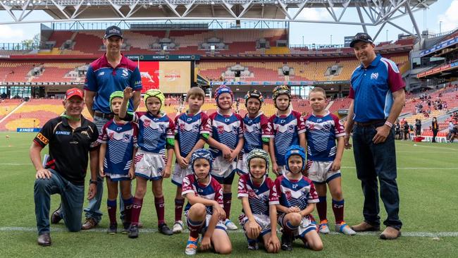 Coaches Scott Walsh and Paul Eakin with the Roma Saints Junior Under 8s team for their match ahead of the Dolphins inaugural game at Suncorp Stadium. Picture: Dolphins Rugby League.