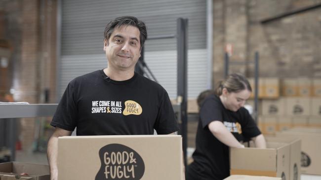 Good &amp; Fugly CEO Rich Tourino with a box of harvested produce. Picture: Supplied