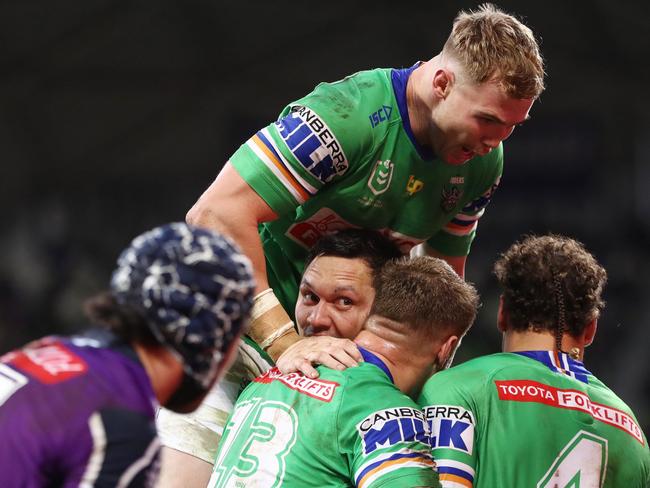 MELBOURNE, AUSTRALIA - JULY 17: The Raiders celebrate after Jordan Rapana (C)of the Raiders scored a try which was later disallowed during the round 18 NRL match between the Melbourne Storm and the Canberra Raiders at AAMI Park, on July 17, 2022, in Melbourne, Australia. (Photo by Mike Owen/Getty Images)