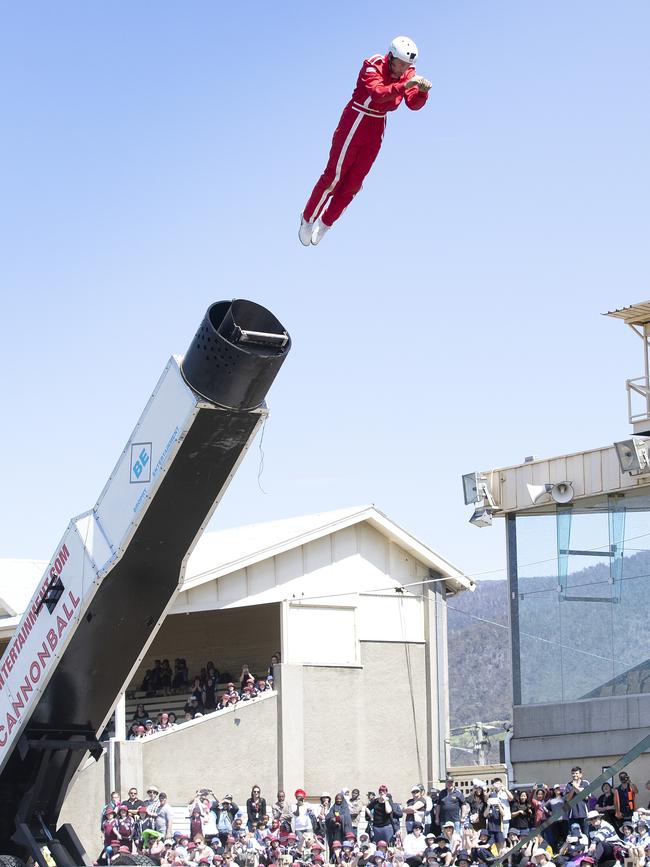 Warren Brophy flying through the air before landing in a safety net. Picture: CHRIS KIDD