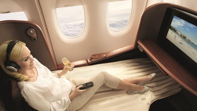 You can watch the clouds go by or pop on the tele in first class on board Singapore Airlines' Boeing 777-300ER aircraft. Supplied.