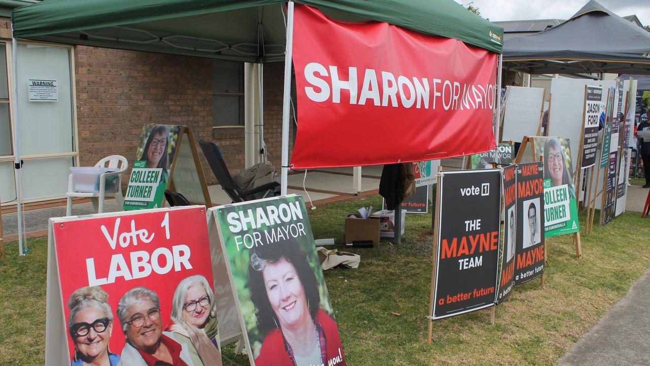 Signs galore at the Batemans Bay Community Centre voting booth on Saturday.