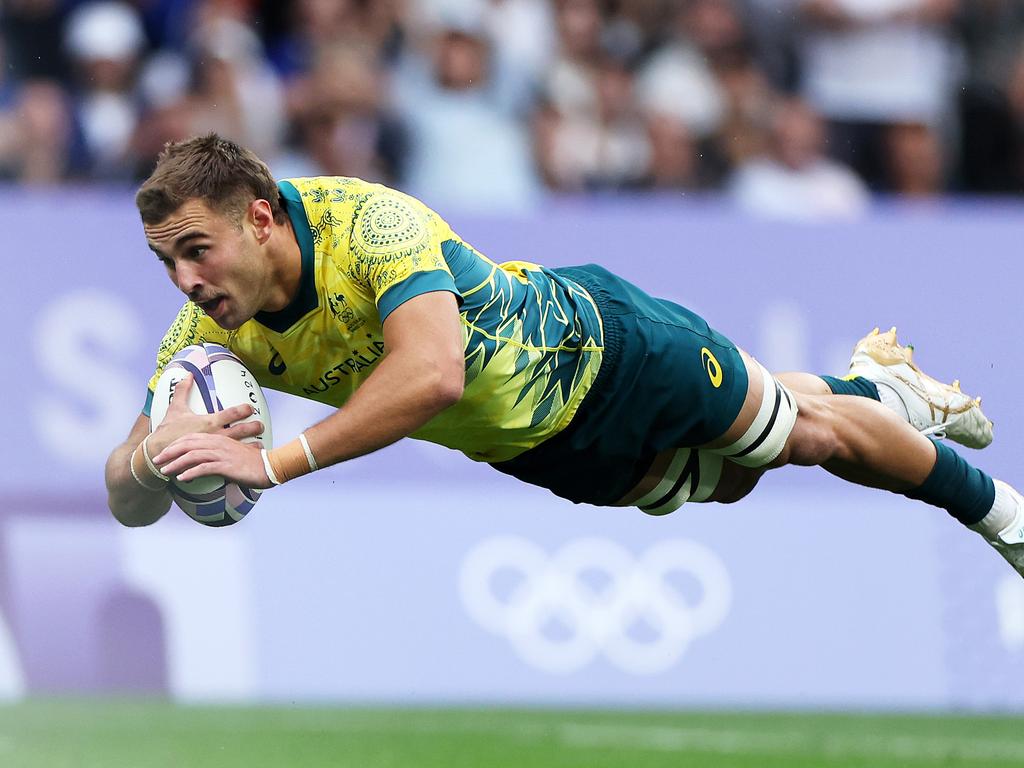 Nathan Lawson scores for Australia during the Paris Olympics. Picture: Hannah Peters/Getty Images