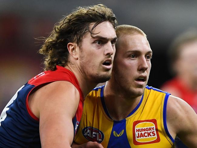 PERTH, AUSTRALIA - AUGUST 09: Luke Jackson of the Demons competes a throw-in with Oscar Allen of the Eagles during the 2021 AFL Round 21 match between the West Coast Eagles and the Melbourne Demons at Optus Stadium on August 9, 2021 in Perth, Australia. (Photo by Daniel Carson/AFL Photos via Getty Images)