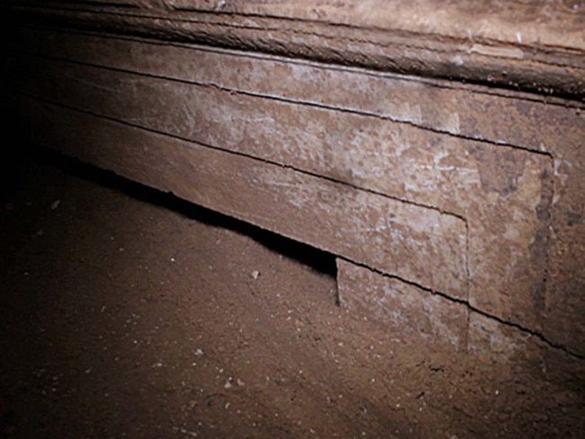 What lies beneath ... Reports suggest a colourful decoration has been glimpsed behind this Ionic-style doorway guarding the Amphipolis tomb’s third chamber.