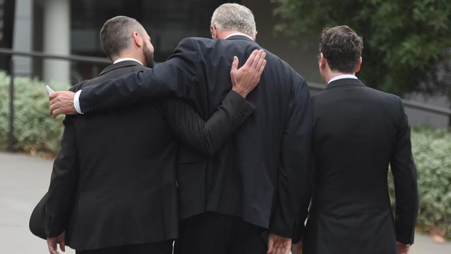 Deputy Headmaster Rohan Brown greeted on his return to work. Picture: Tony Gough