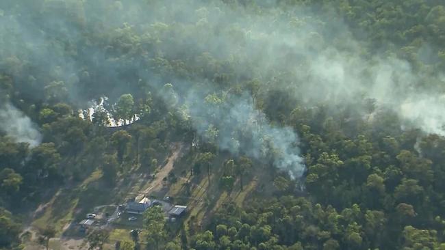 An aerial view of a Wieambilla property where two police officers were shot dead, and where police were later involved in a deadly firefight that killed three suspects. Source: Nine