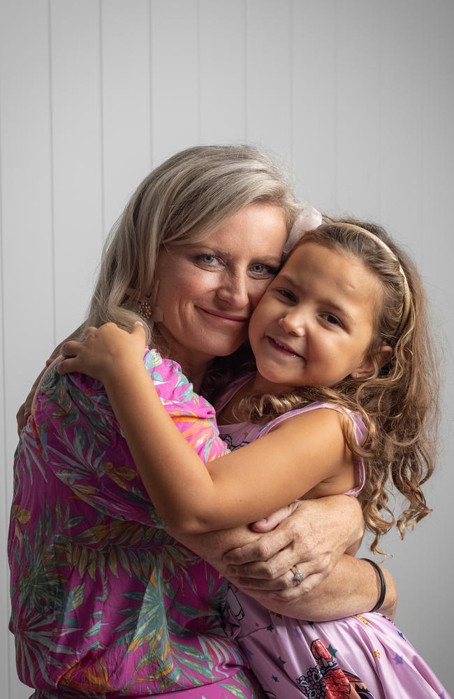 Darling little Ava Pearce and mum Amanda Pearce having a snuggle. Picture: David Kelly