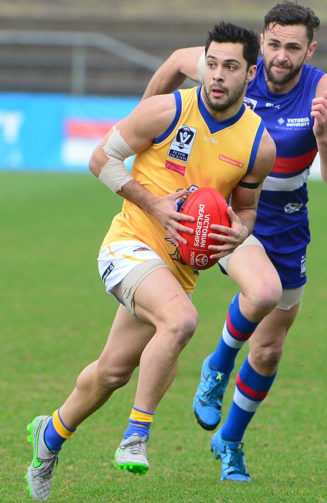 Williamstown rover Michael Gibbons on the burst against the Bulldogs.