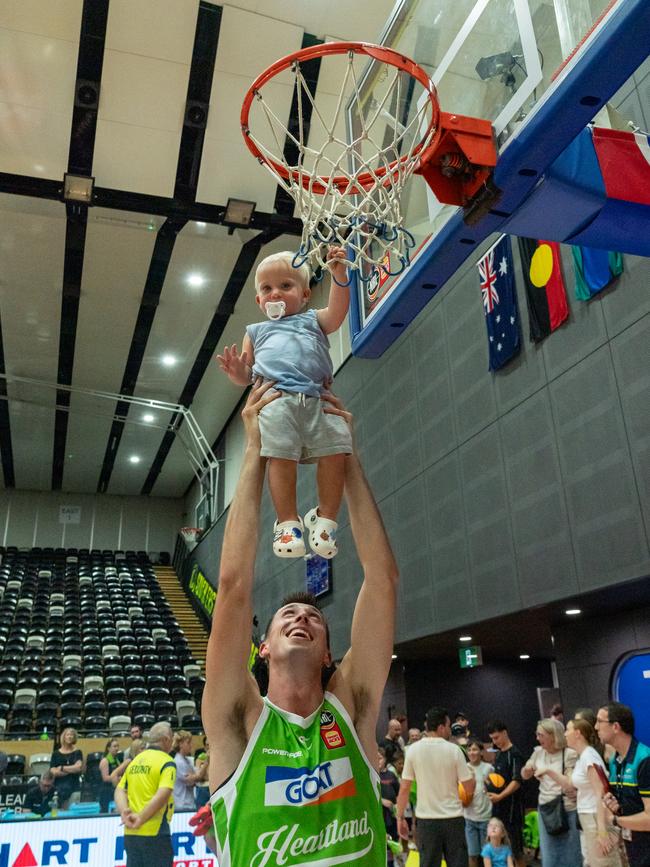 Joe Weiskamp sharing a special moment, post-game, with son Jace. Picture: Kadek Thatcher/Phoenix Media