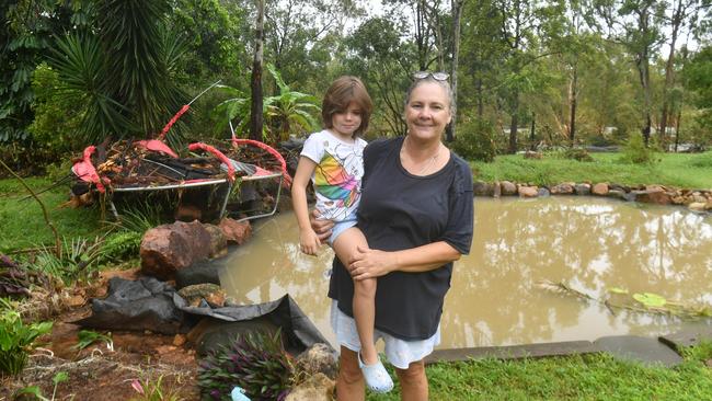 Donna Lucker and granddaughter Dezire, 5, at her son's home affected by floodwater from Bluewater Creek. Picture: Evan Morgan