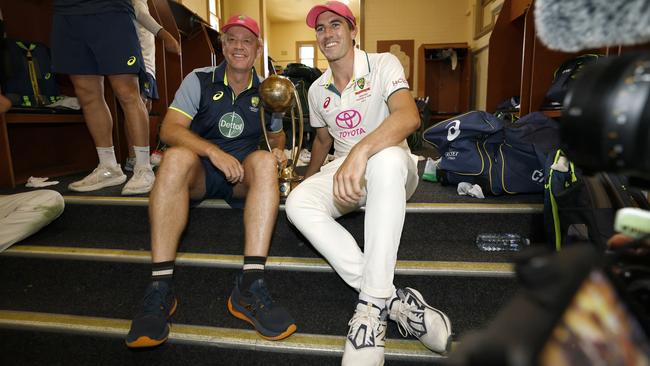 Australian coach Andrew McDonald and captain Pat Cummins pose with the Border Gavaskar Trophy Picture: Getty Images