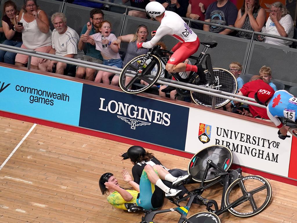 Matt Walls catapults over the siding and into the crowd. Picture: John Walton/PA Wire. .