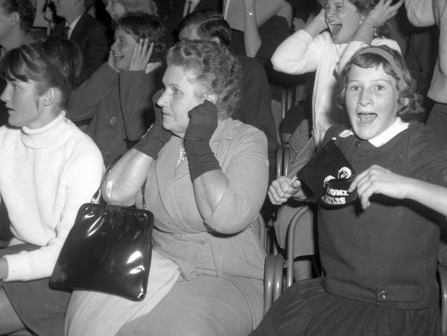 Different reactions to the music at The Beatles concert at Festival Hall. Picture by Bill Whalley