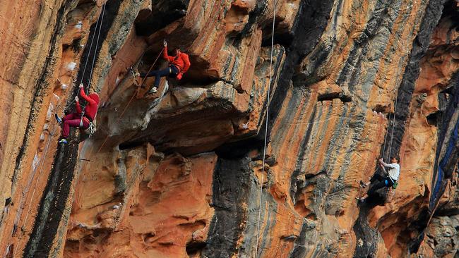 Rock climbers tackle the 'Taipan Wall' in the Grampians. Picture: Aaron Francis