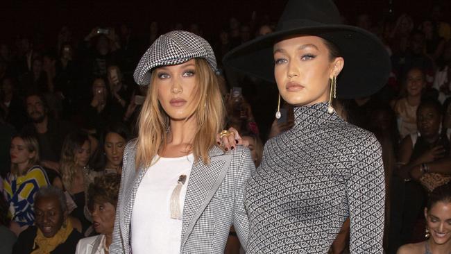 Gigi Hadid, right, with her sister Bella Hadid at Tommy Hilfiger’s New York fashion week show. Picture: Andy Kropa/Invision/AP