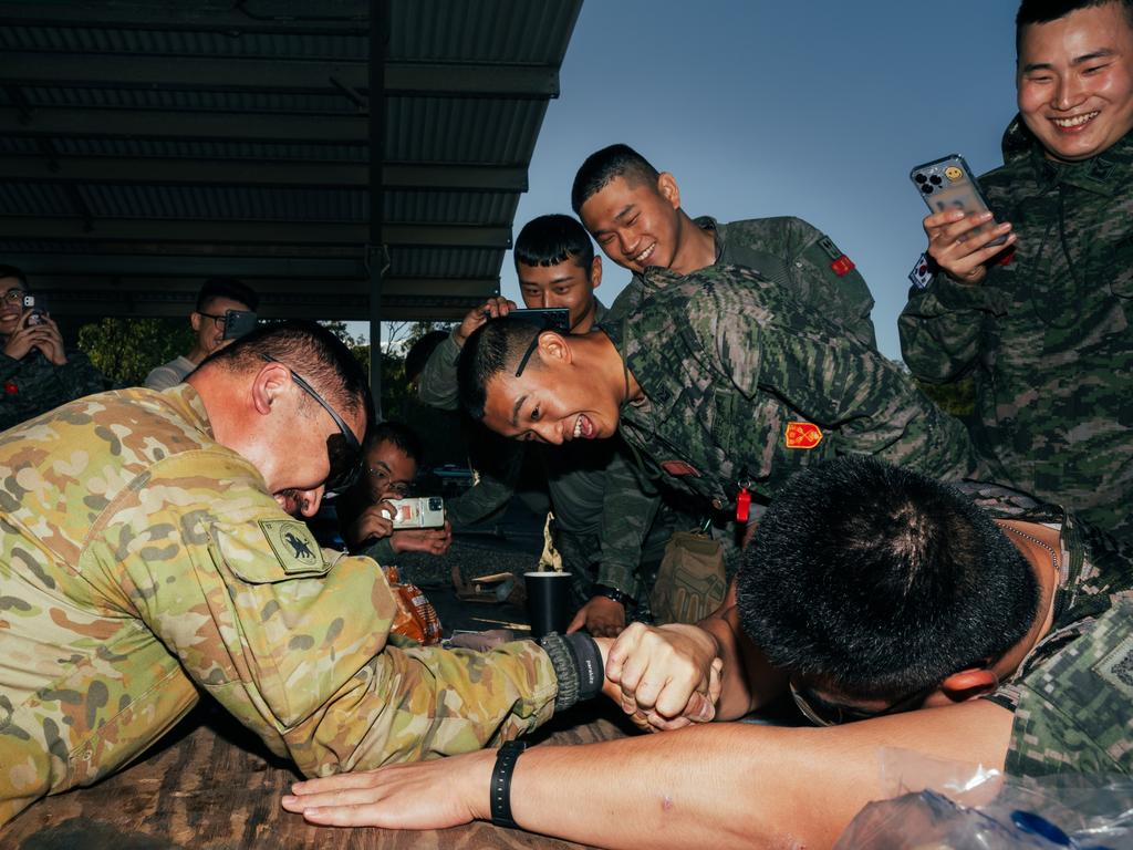 Soldiers from the Australian Army and the Republic of Korea battle in a friendly arm wrestle competition in the lead up to Exercise Talisman Sabre 2023. Picture: Adam Abela