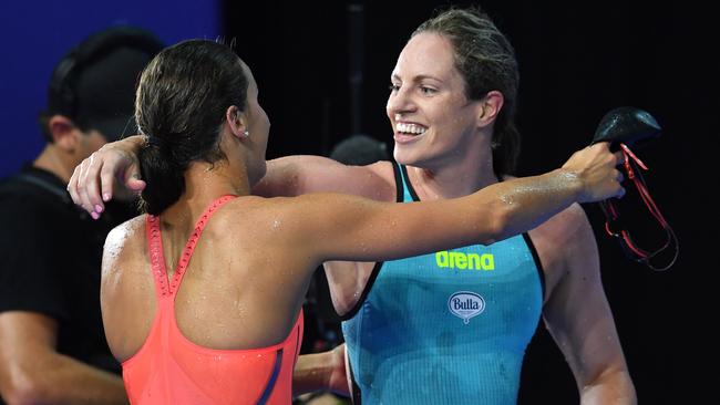 Emily Seebohm and Katylee McKeown embrace after the final. Pic: AAP