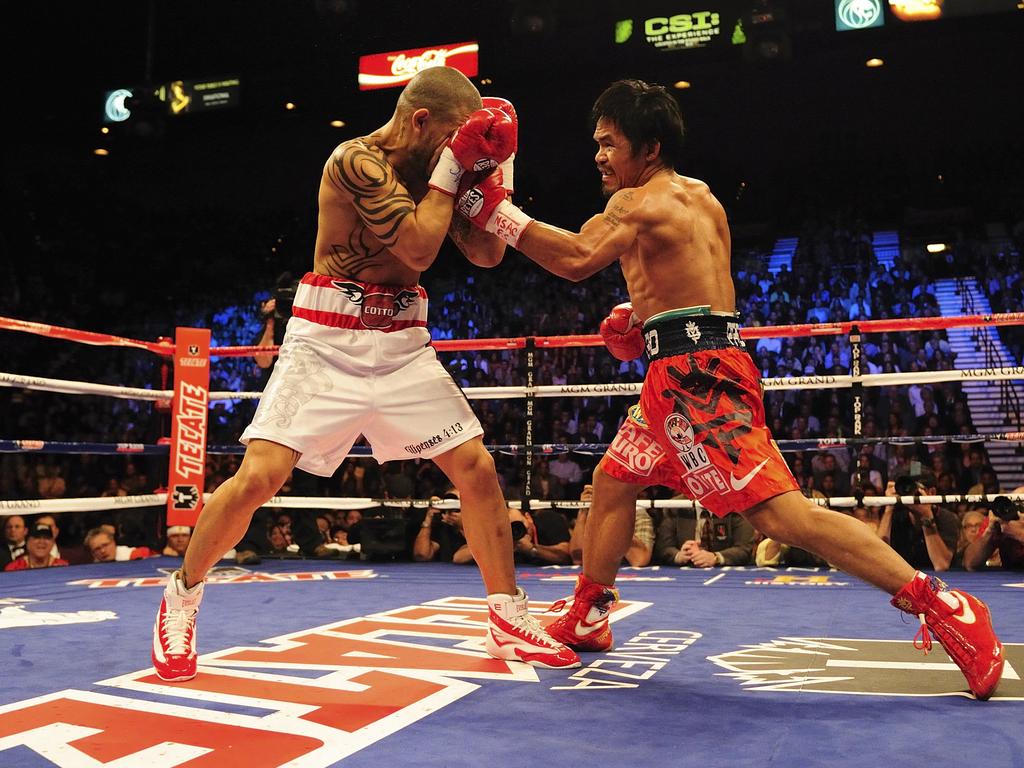 When Manny Pacquiao (R) fought Miguel Cotto (L) in 2009, Tszyu was in the stands. Picture: Robert Beck /Sports Illustrated via Getty Images
