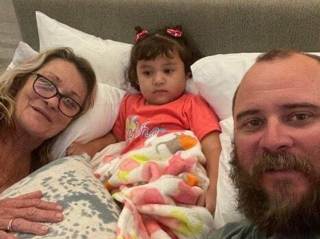 Adelynn, 2, after being reunited with her Mackay uncle Ben Shanks and grandmother Leanne in Cancun in Mexico after she was dumped at church. Her parents remain missing. Picture: Contributed