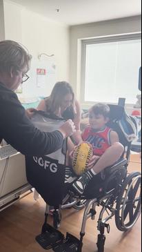 9yo with brain cancer gifted Port Adelaide memorabilia