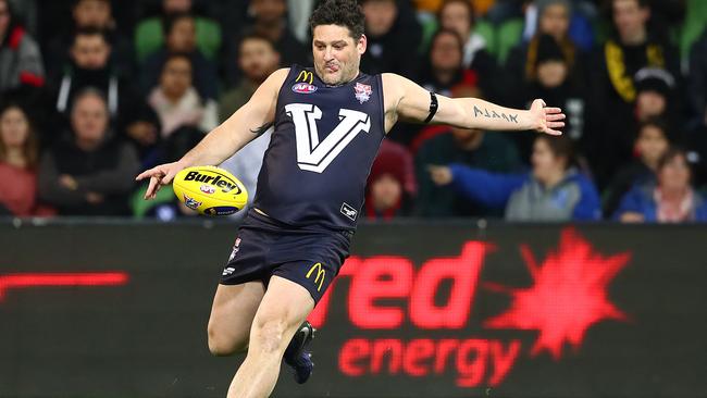 Brendan Fevola kicks the ball for Victoria during the EJ Whitten Legends Game at AAMI Park in 2019. Picture: Getty Images