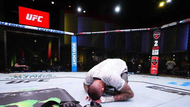 LAS VEGAS, NEVADA - MARCH 02: Tyson Pedro of Australia announces his retirement after a loss against Vitor Petrino of Brazil in a light heavyweight bout during the UFC Fight Night event at UFC APEX on March 02, 2024 in Las Vegas, Nevada. (Photo by Jeff Bottari/Zuffa LLC via Getty Images)