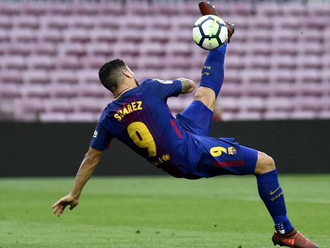 Barcelona’s Luis Suarez kicks the ball during the Spanish league football match. Picture: Jose Jordan/AFP