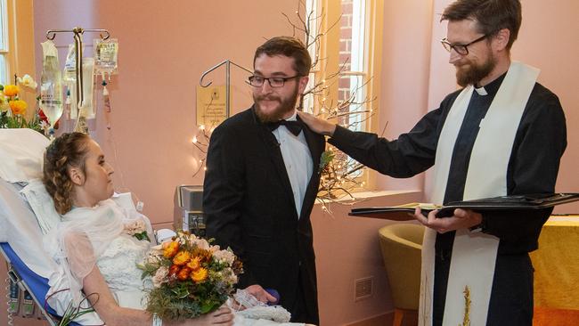 The Reverend Chris Morris conducts the ceremony. Picture: Jay Town