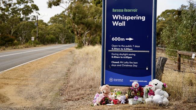 Tributes at the entrance to the whispering wall at Williamstown. Picture: Mike Burton