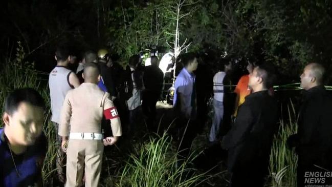 Police and locals gather following the grim find. Picture: Thai PBS